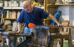 Glass bead artisan working in Murano Venice