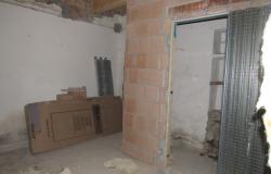 Partly renovated, habitable, 2 bedroom, stone house in the old part of town with terrace and courtyard. 11