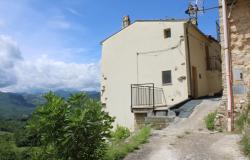 Duplex apartment above a stream, stone structure, habitable, 3 beds, amazing open views, background rushing water 0