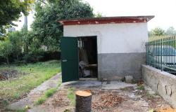 Historic country house with stone walls and garden and garage, original tiles from the 50s and seems solid and dry  1