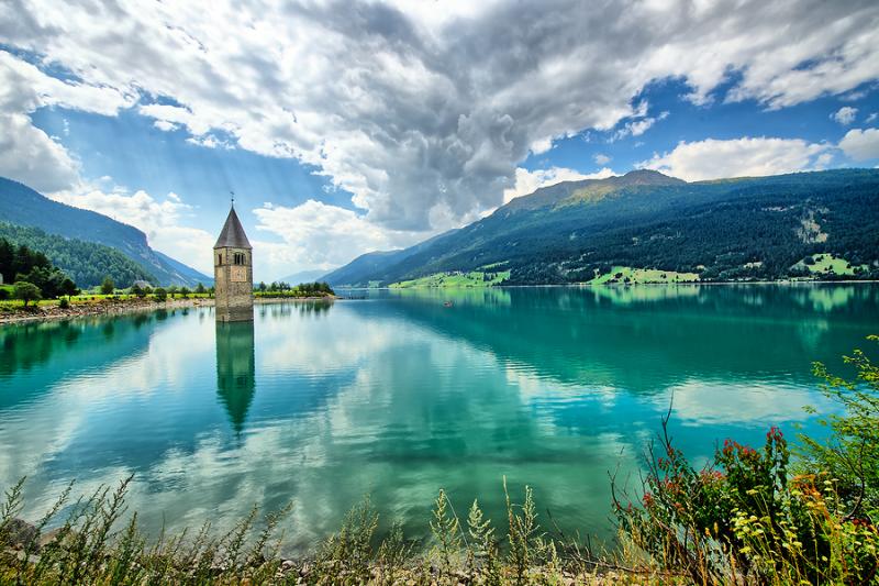 Submerged bell tower at Lake Resia in Val Venosta Italy