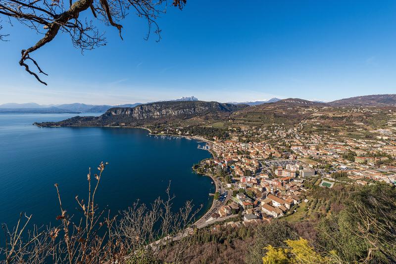 Aerial View of the Small Garda Town, tourist resort on the coast of Lake Garda, view from the Rocca di Garda, small hill overlooking the lake