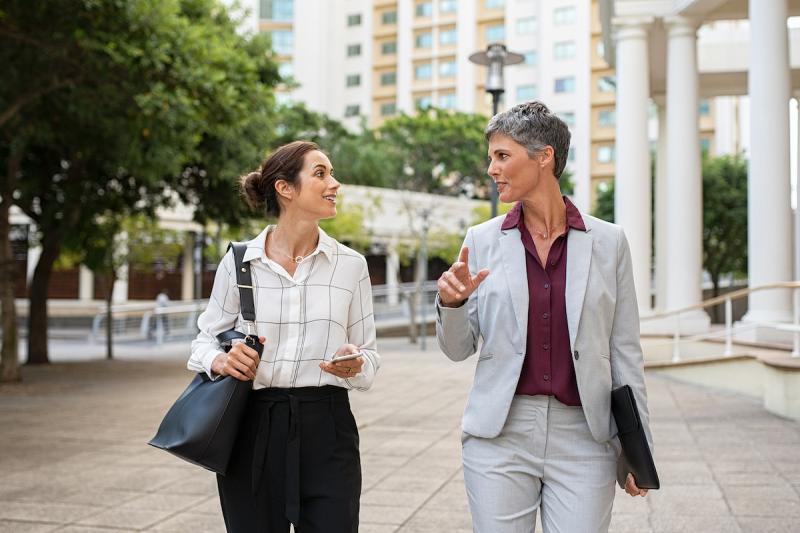 two business women in conversation