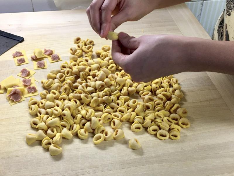 Woman making fresh pasta in Bologna