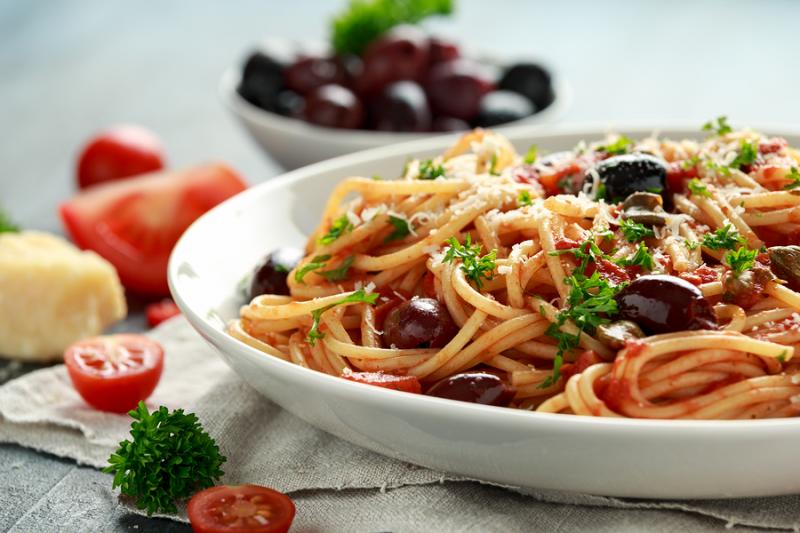 Close-up of spaghetti puttanesca dish