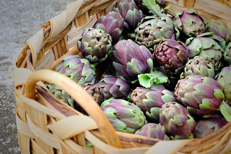 Basket of raw roman artichokes